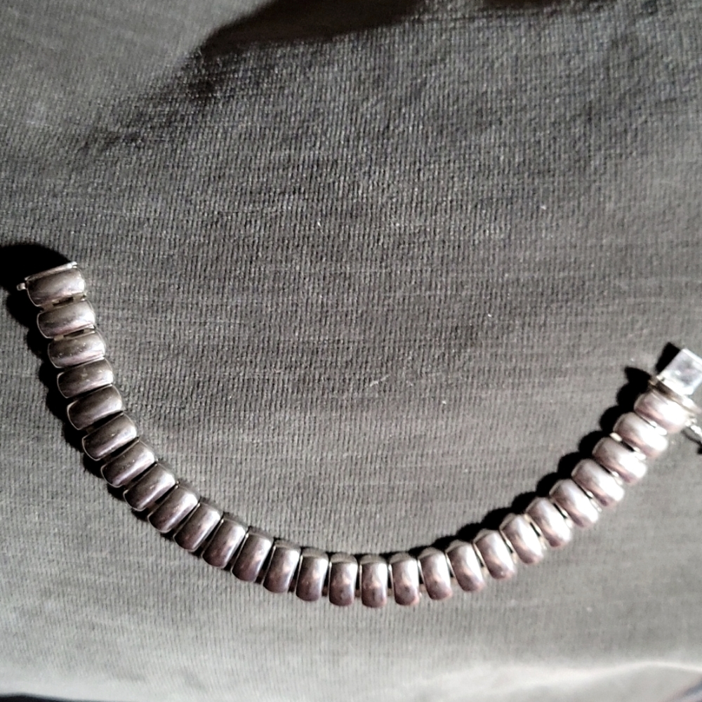 Sterling Silver bracelet from Italy, 8" long.